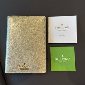 BNWT Kate Spade Passport holder - Gold colour